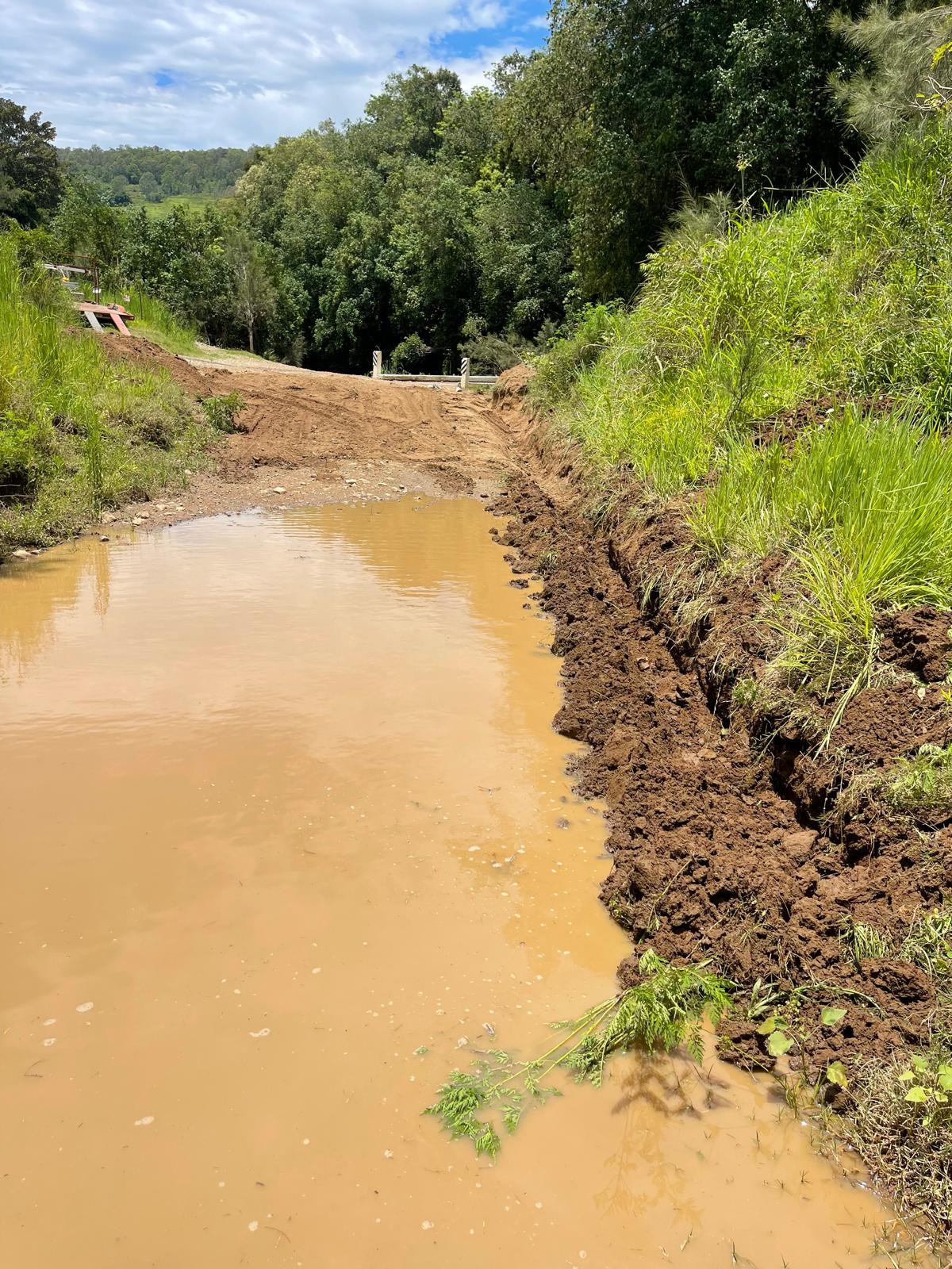 Wet site earthworks and ground preparation on a sloping property